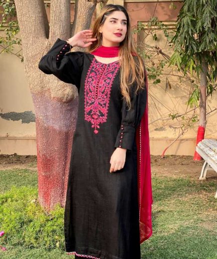 3-piece Black Embroidered Khaddar Dress with Shocking Pink Chiffon Dupatta and elegant black khaddar trousers.